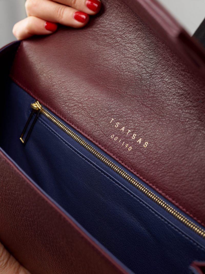 HAZE clutch bag in burgundy calfskin leather | TSATSAS