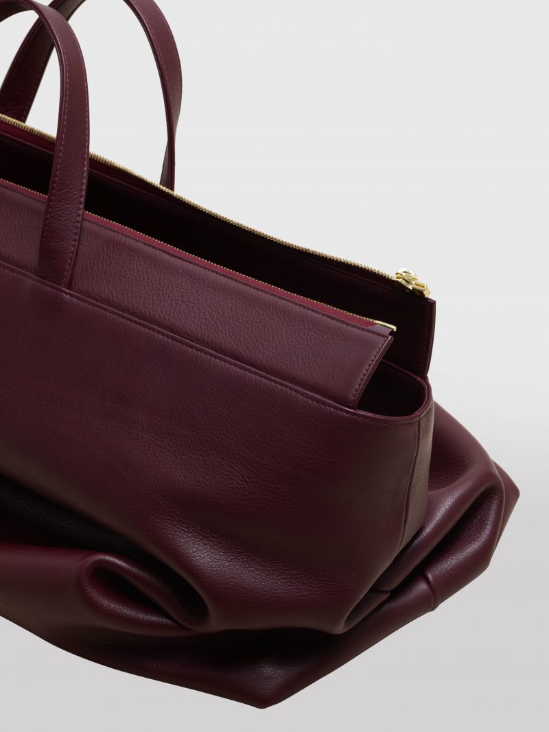 KHAMSIN weekender in burgundy calfskin leather | TSATSAS