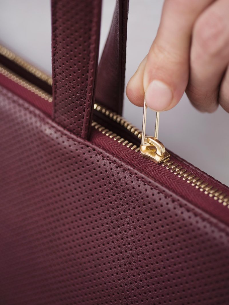 LUCID tote bag in perforated burgundy calfskin leather | TSATSAS