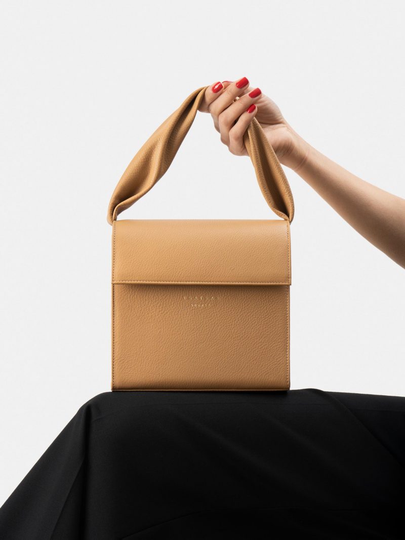 RHEI top handle bag in cashew calfskin leather | TSATSAS