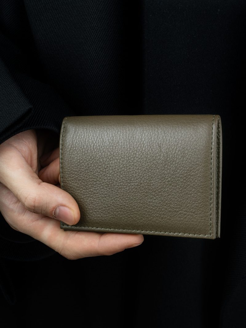 VOID card holder in khaki green calfskin leather with contrasting black lamb nappa leather | TSATSAS