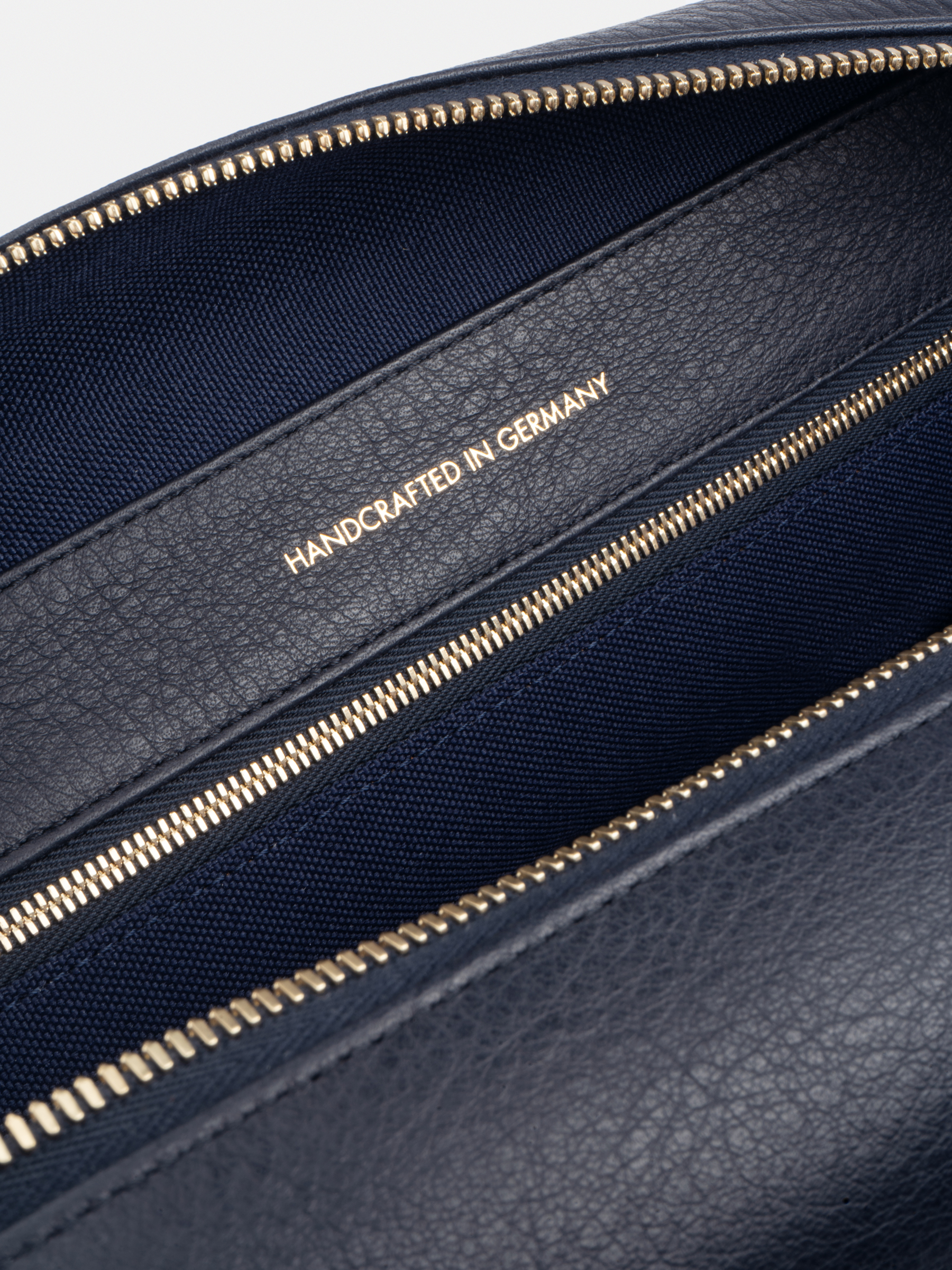 BASALT 2 wash bag in navy blue calfskin leather | TSATSAS