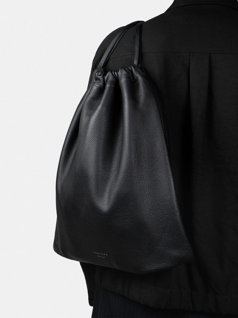 XELA backpack in black calfskin leather | TSATSAS