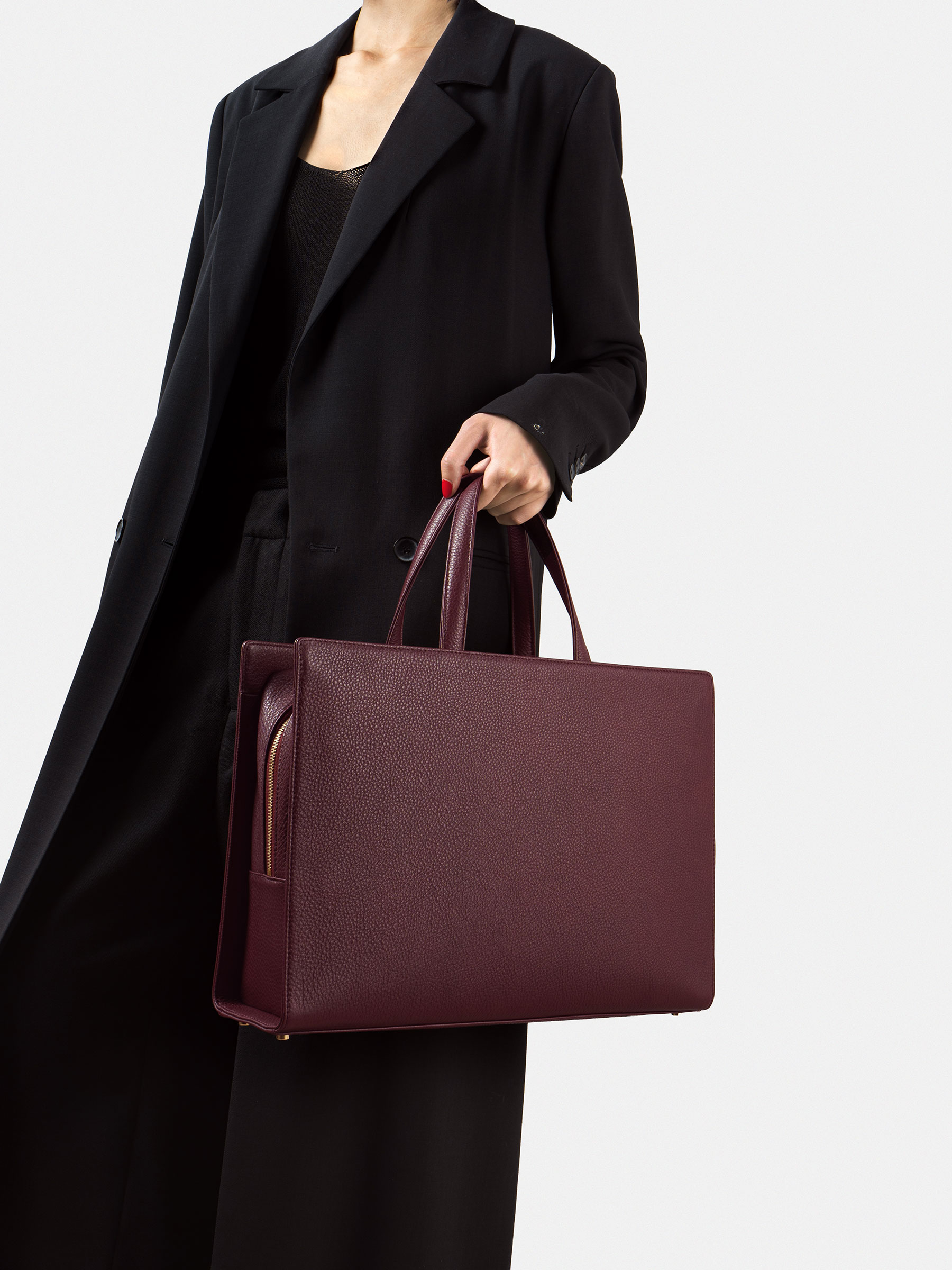 DELTOUR structured tote bag in burgundy calfskin leather | TSATSAS